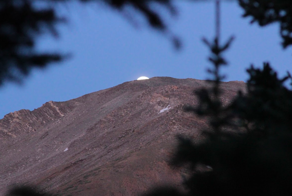 The Moon Over Mount Massive During Sunrise